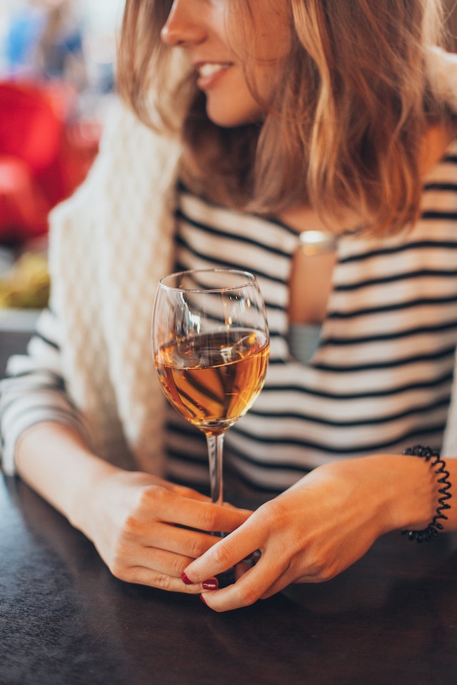 A women drinking wine