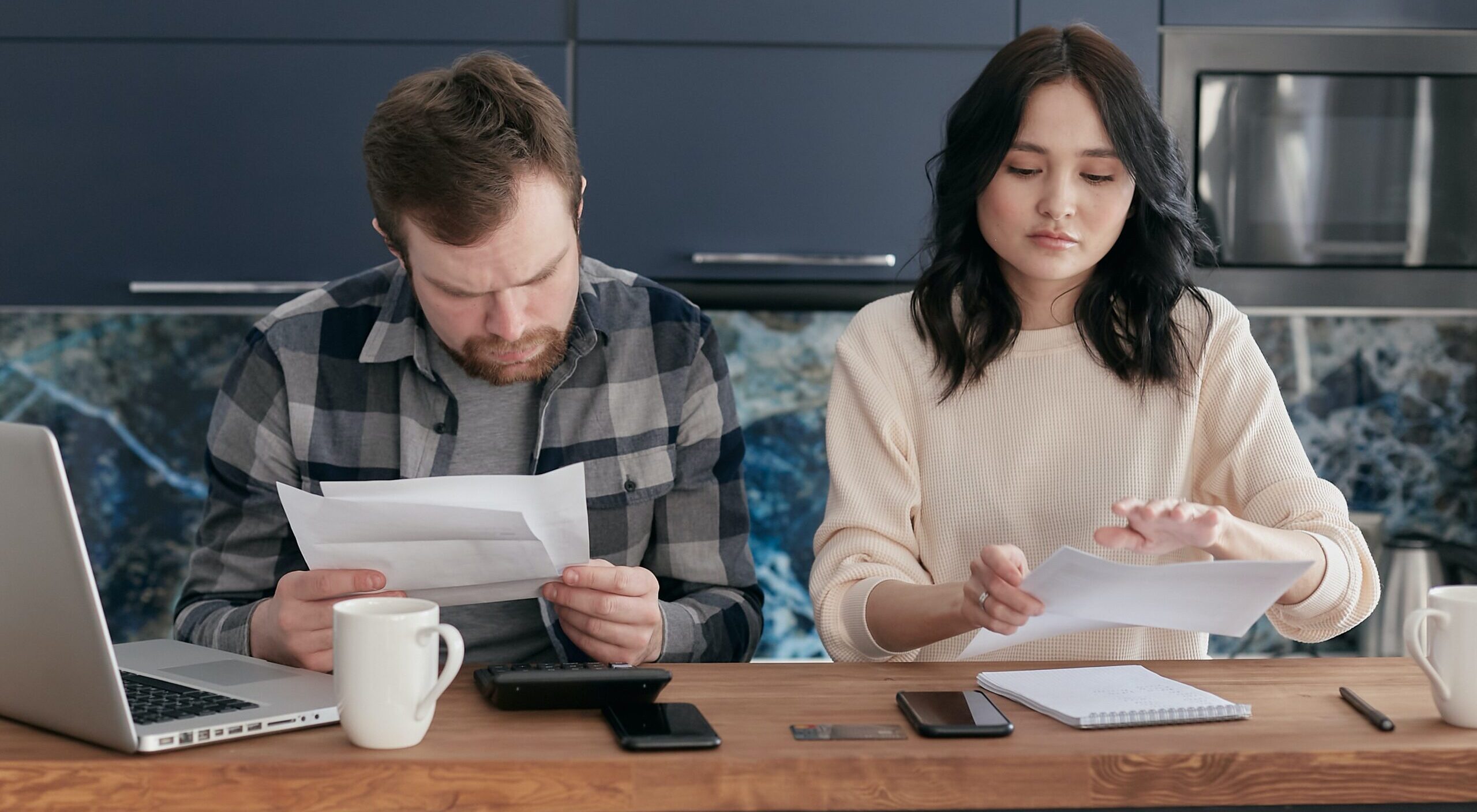 Couple going through their finances 