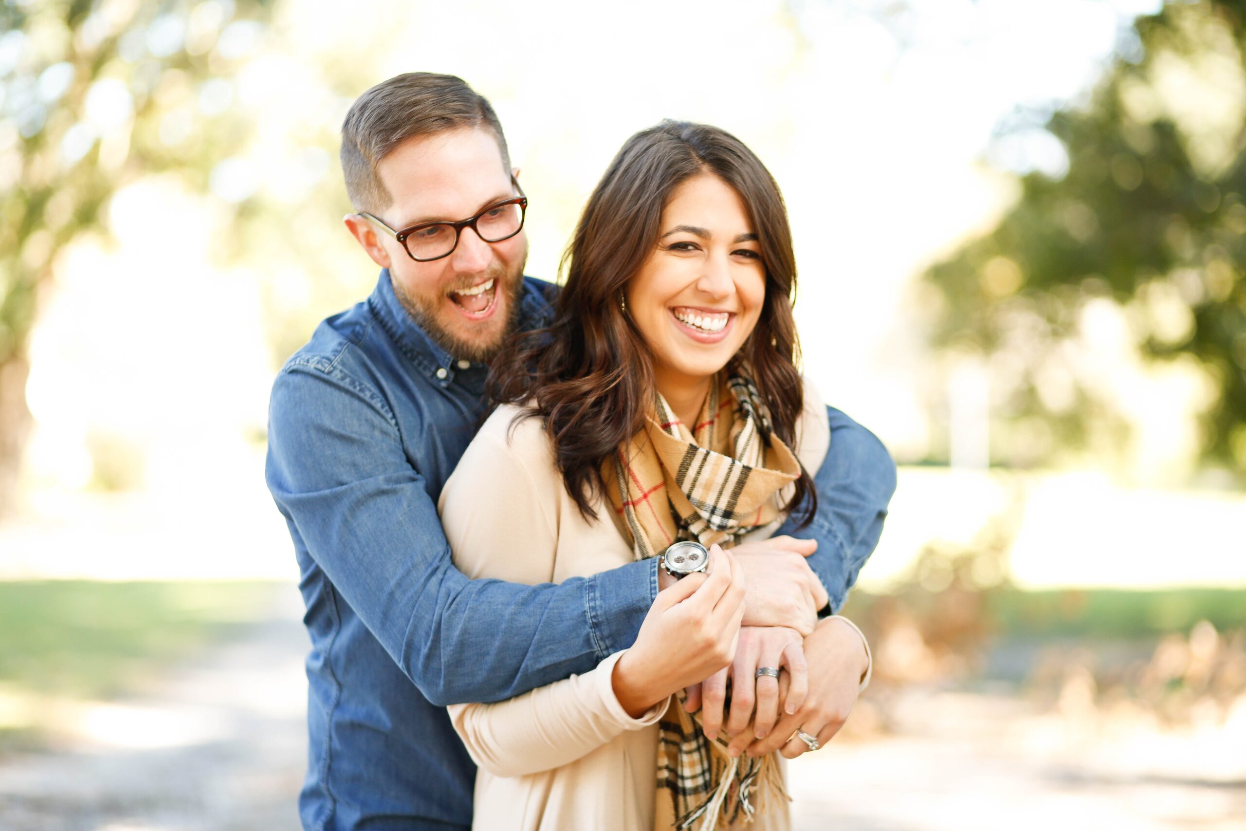 A happy couple holding each other